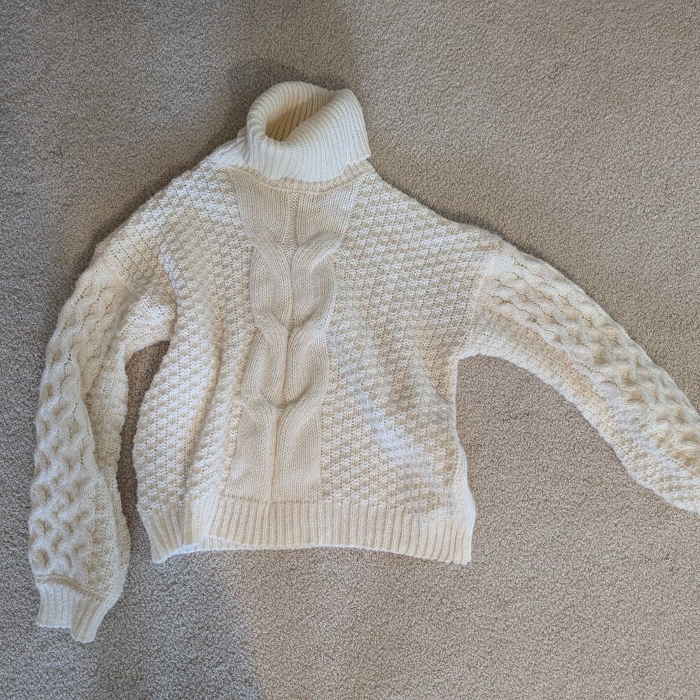 Cable turtleneck sweater